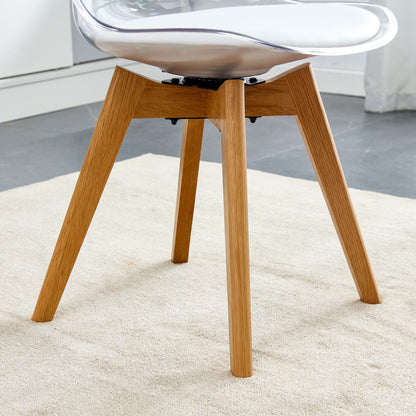 Modern chairs can rotate 360 degrees. The backrest is made of PET material, the seat cushion is made of PU material, and the support legs are made of oak. (Set of 4)