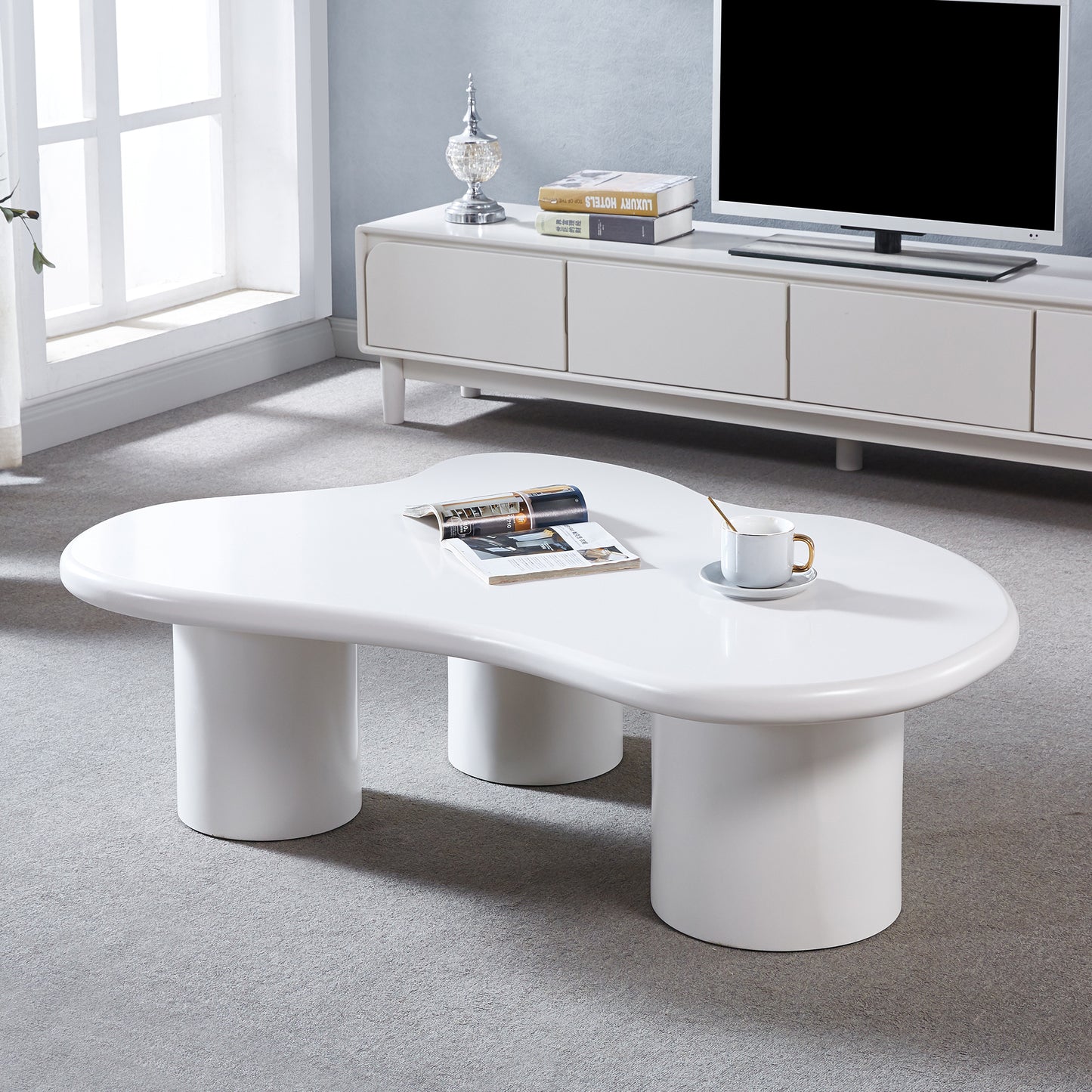 Modern Style Coffee Table with Unique Desktop Design and Elegant White Paint