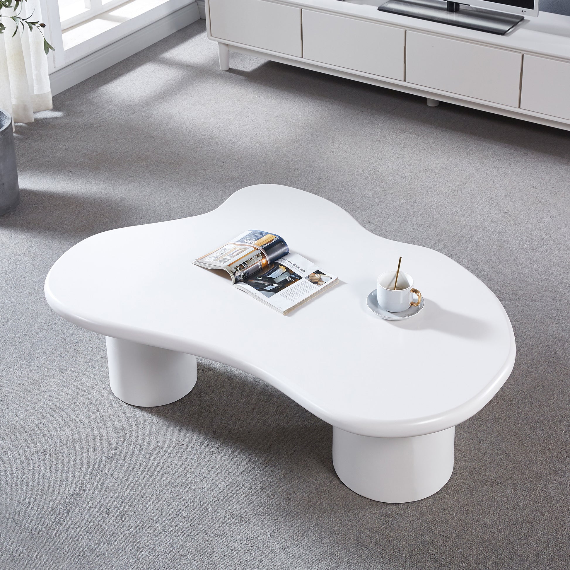 Modern Style Coffee Table with Unique Desktop Design and Elegant White Paint