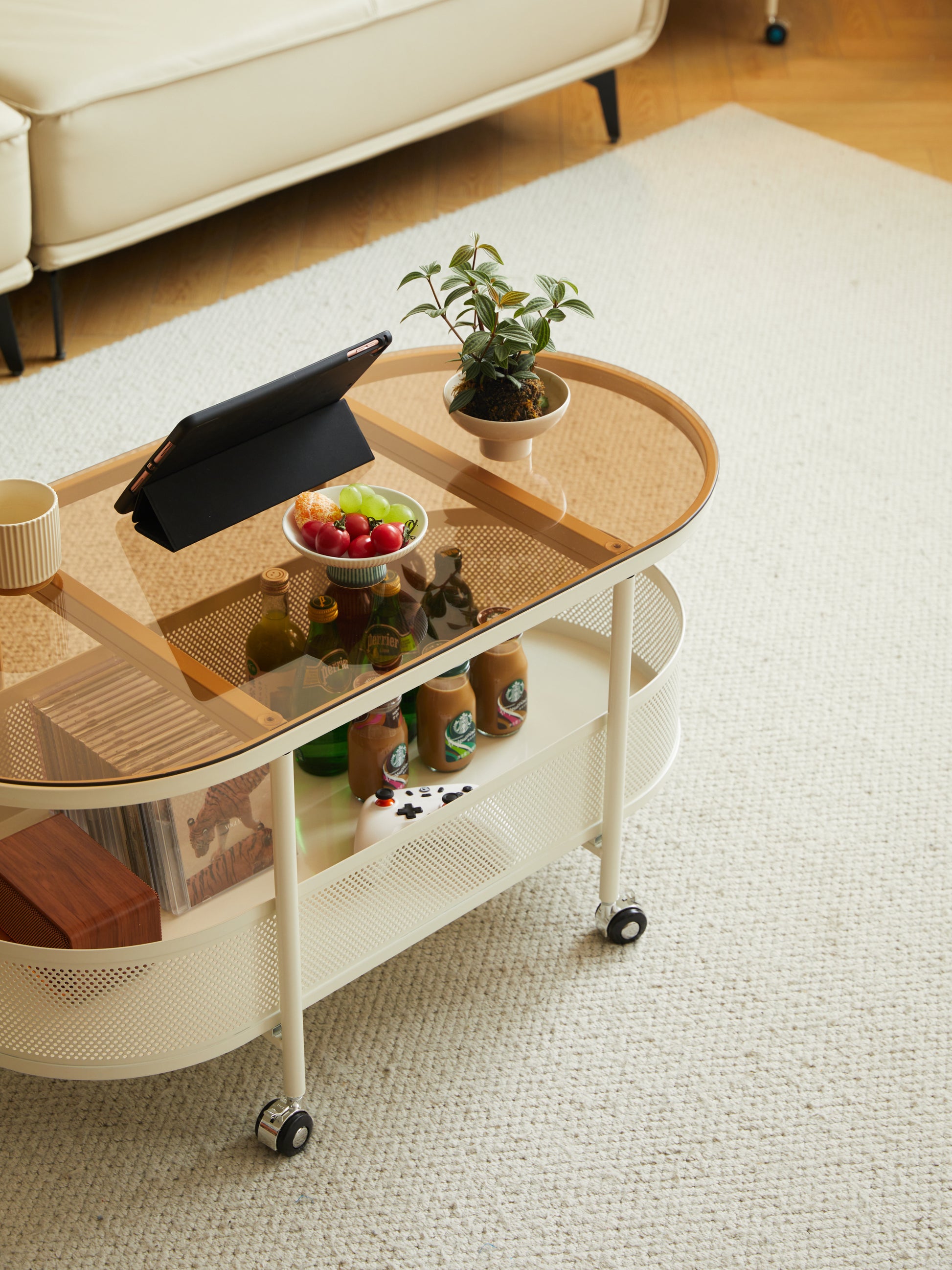 Movable oval metal glass coffee table with storage