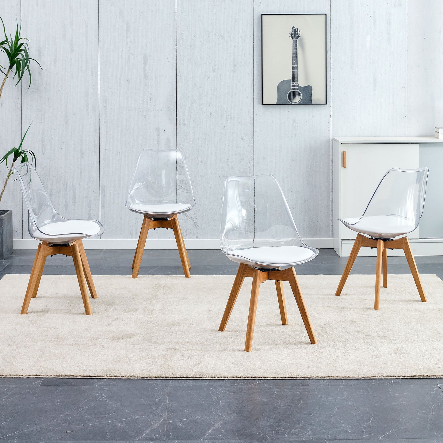 Modern chairs can rotate 360 degrees. The backrest is made of PET material, the seat cushion is made of PU material, and the support legs are made of oak. (Set of 4)