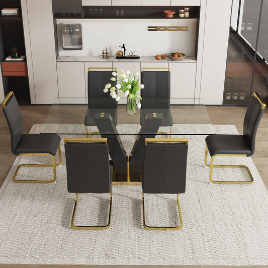 Table and chair set.Subtle Luxury Clear Tempered Glass Dining Set - 71"x35.4" with 6 Black PU Chairs.C-tube Gold Metal Chair Legs.Bring a comfortable home experience to the kitchen, bedroom.