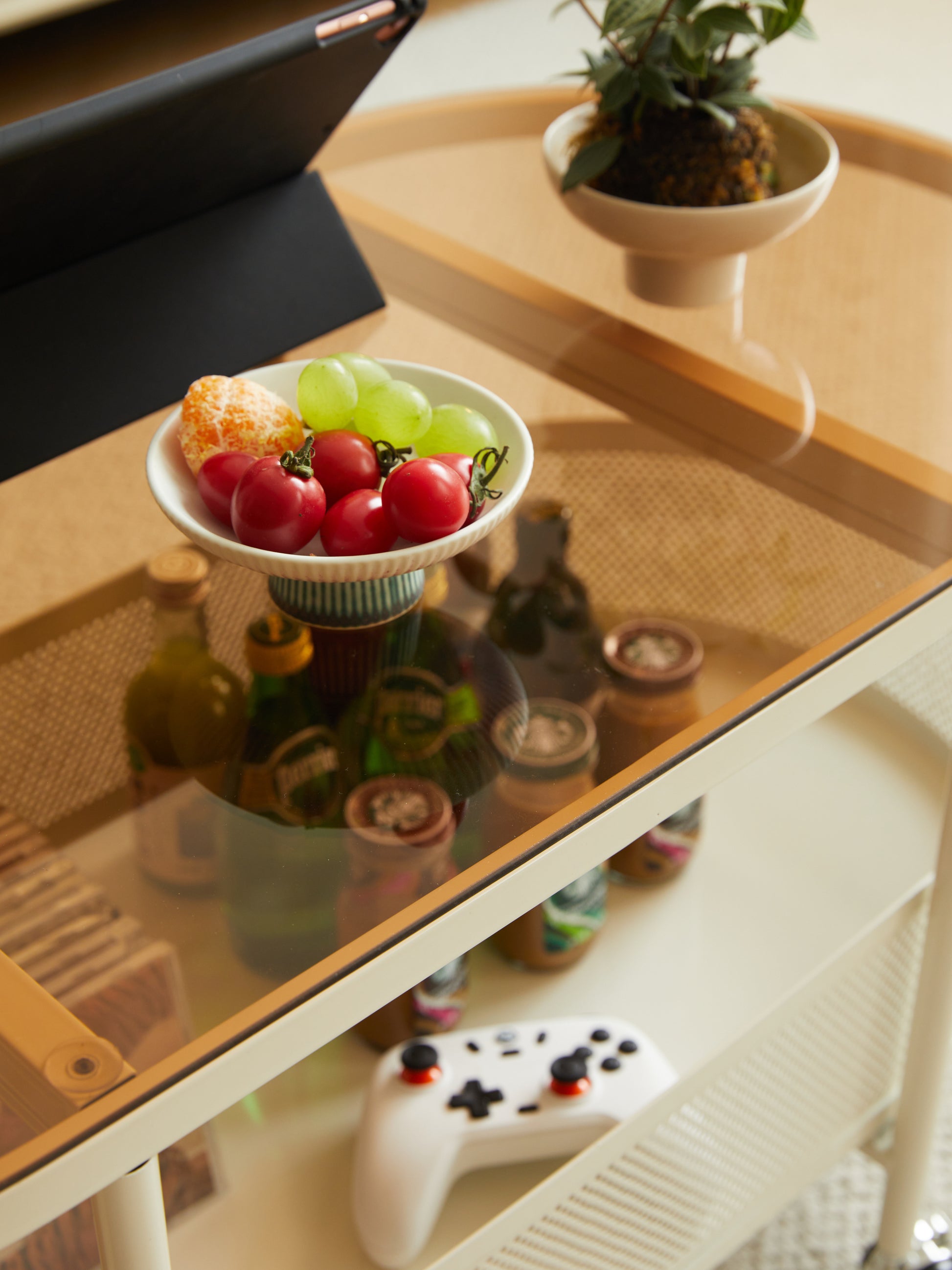 Movable oval metal glass coffee table with storage