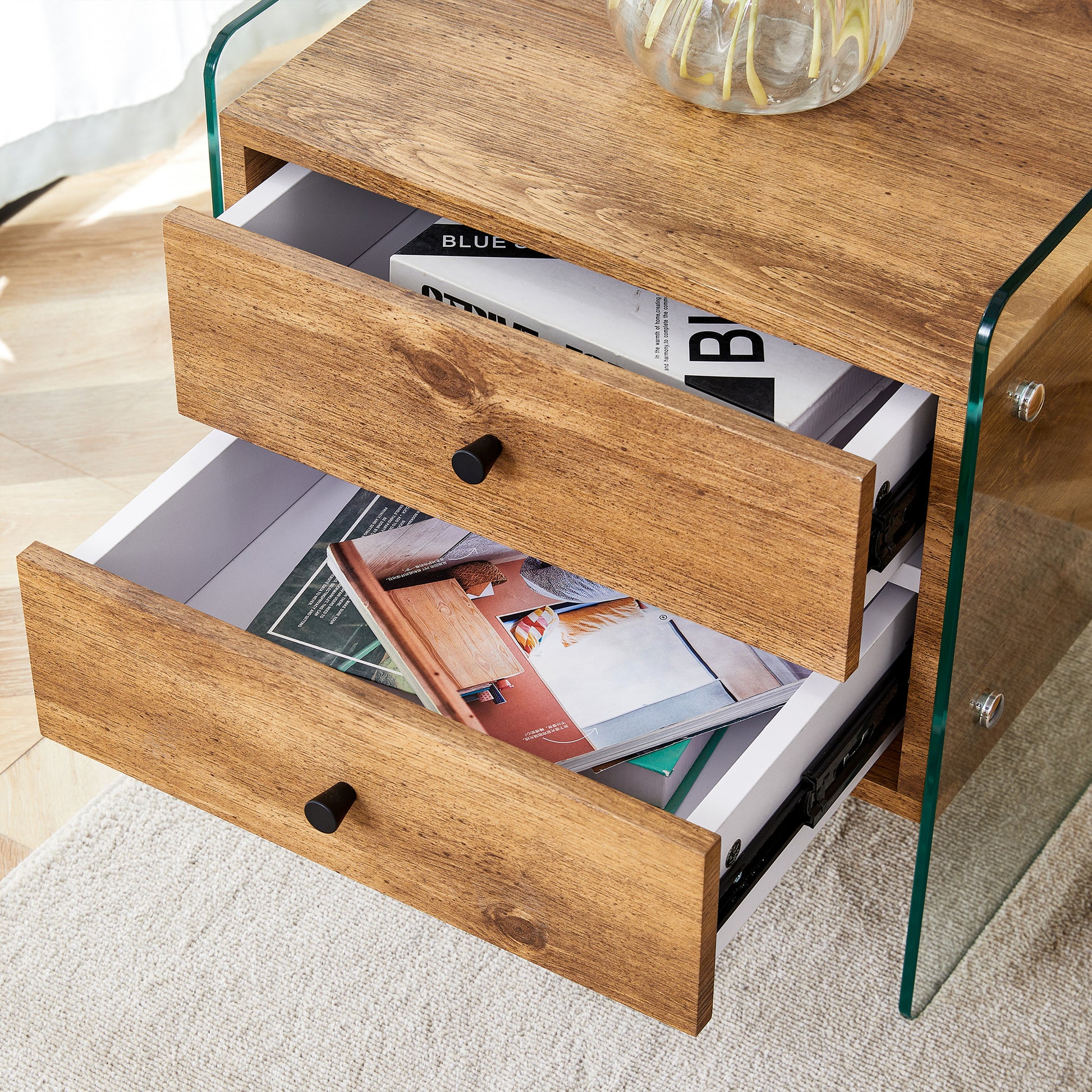 Double-drawer bedside table. The board surface is MDF sticker, and both sides are transparent tempered glass. The design is simple and elegant, with excellent storage functions.