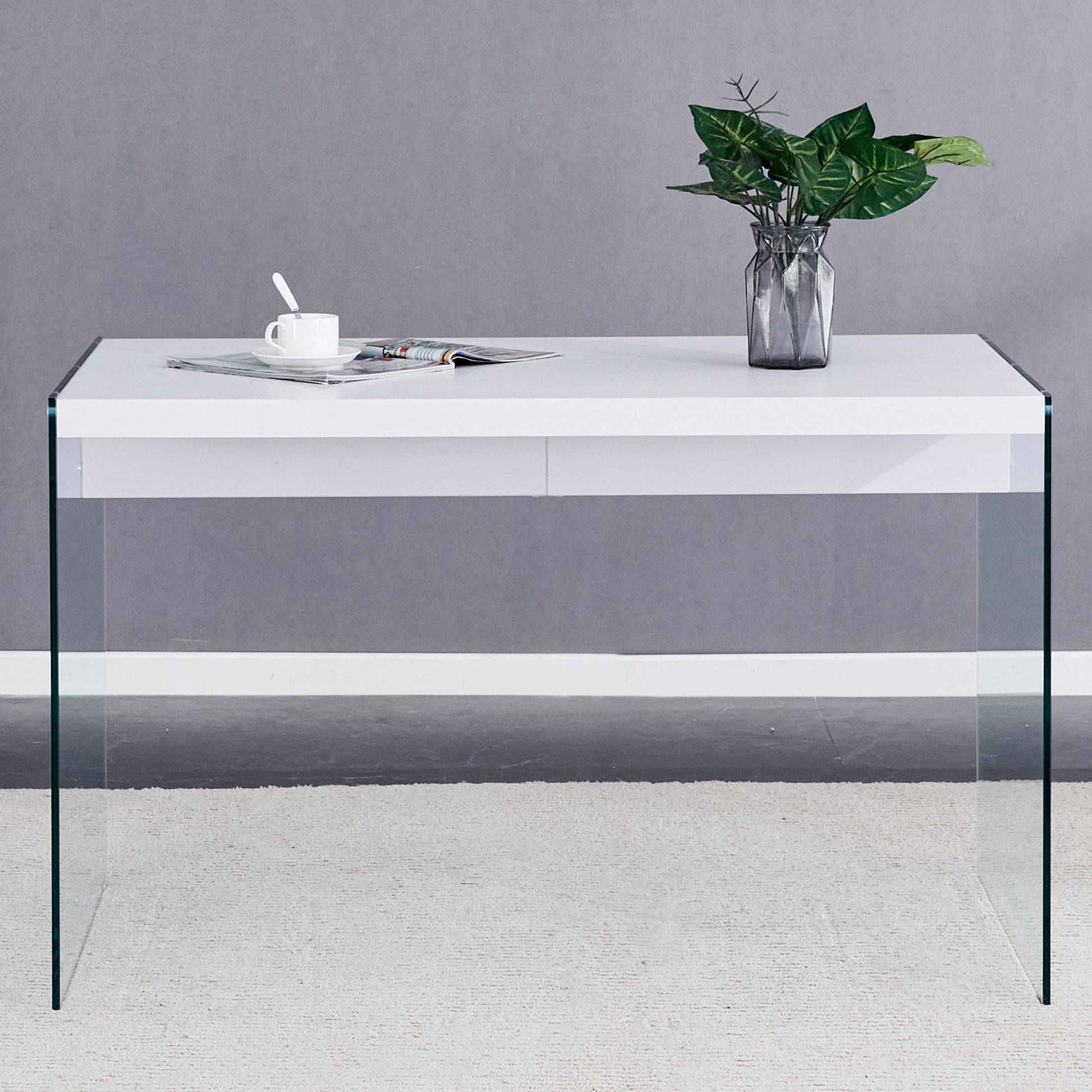 The top of the coffee table is made of MDF and white stickers, and the sides are clear tempered glass. The design is simple and elegant, and the structure is strong.