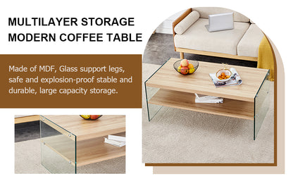 Double layered rectangular coffee table.The board is made of MDF with wooden stickers, with transparent tempered glass on both side.Suitable for various occasions such as living rooms and bedrooms.