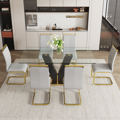 Table and chair set.Subtle Luxury Clear Tempered Glass Dining Set - 71"x35.4" with 6 Light Gray PU Chairs.C-tube Gold Metal Chair Legs.Bring a comfortable home experience to the kitchen, bedroom.