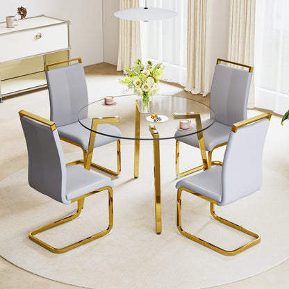 Table and chair set.Modern Luxurious Round Tempered Glass Dining Table Set-40*40 inch with 4 Light Gray PU Chairs.C-tube Gold Metal Chair Legs.Bring a comfortable home experience to the kitchen.