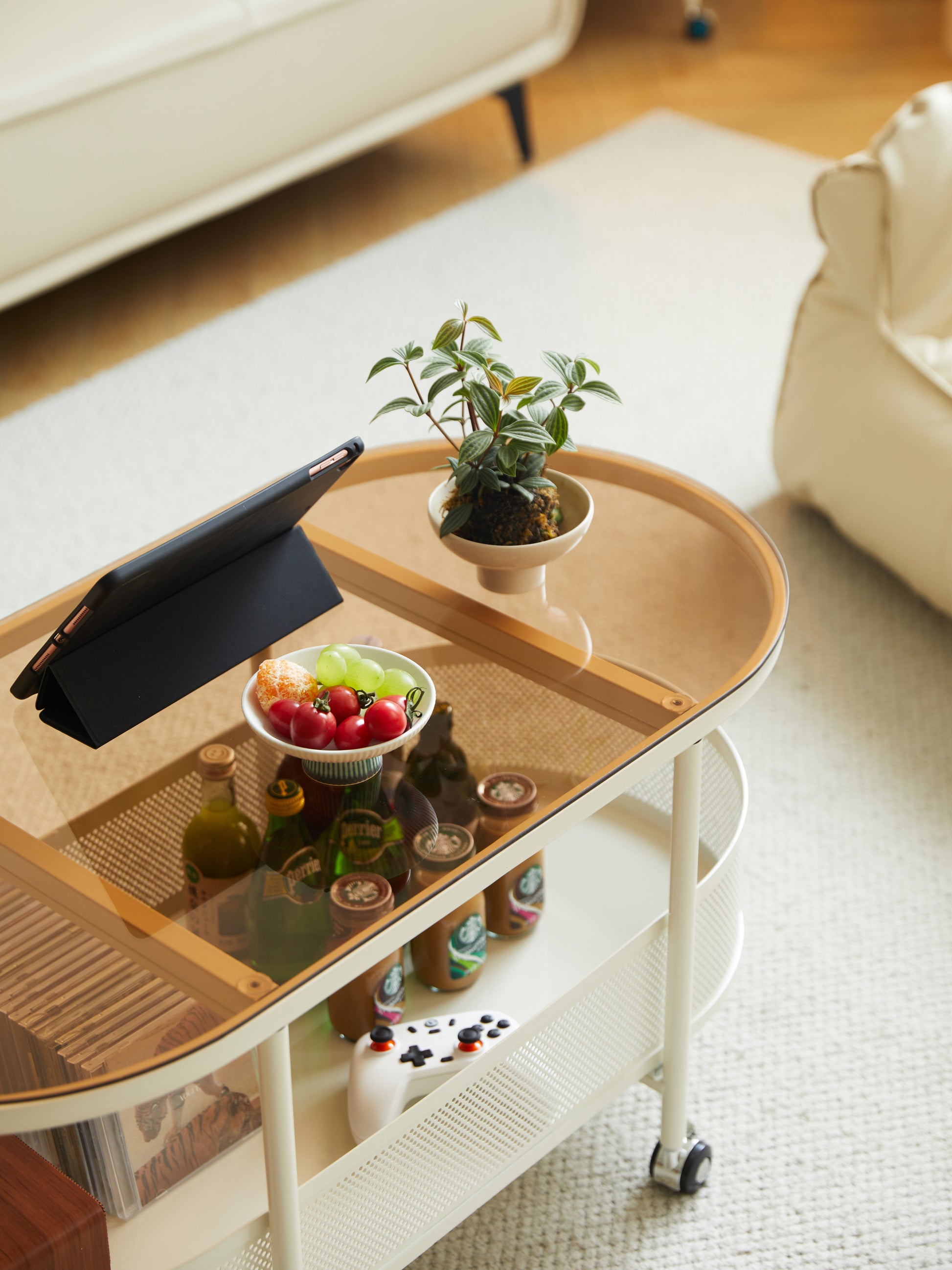 Movable oval metal glass coffee table with storage