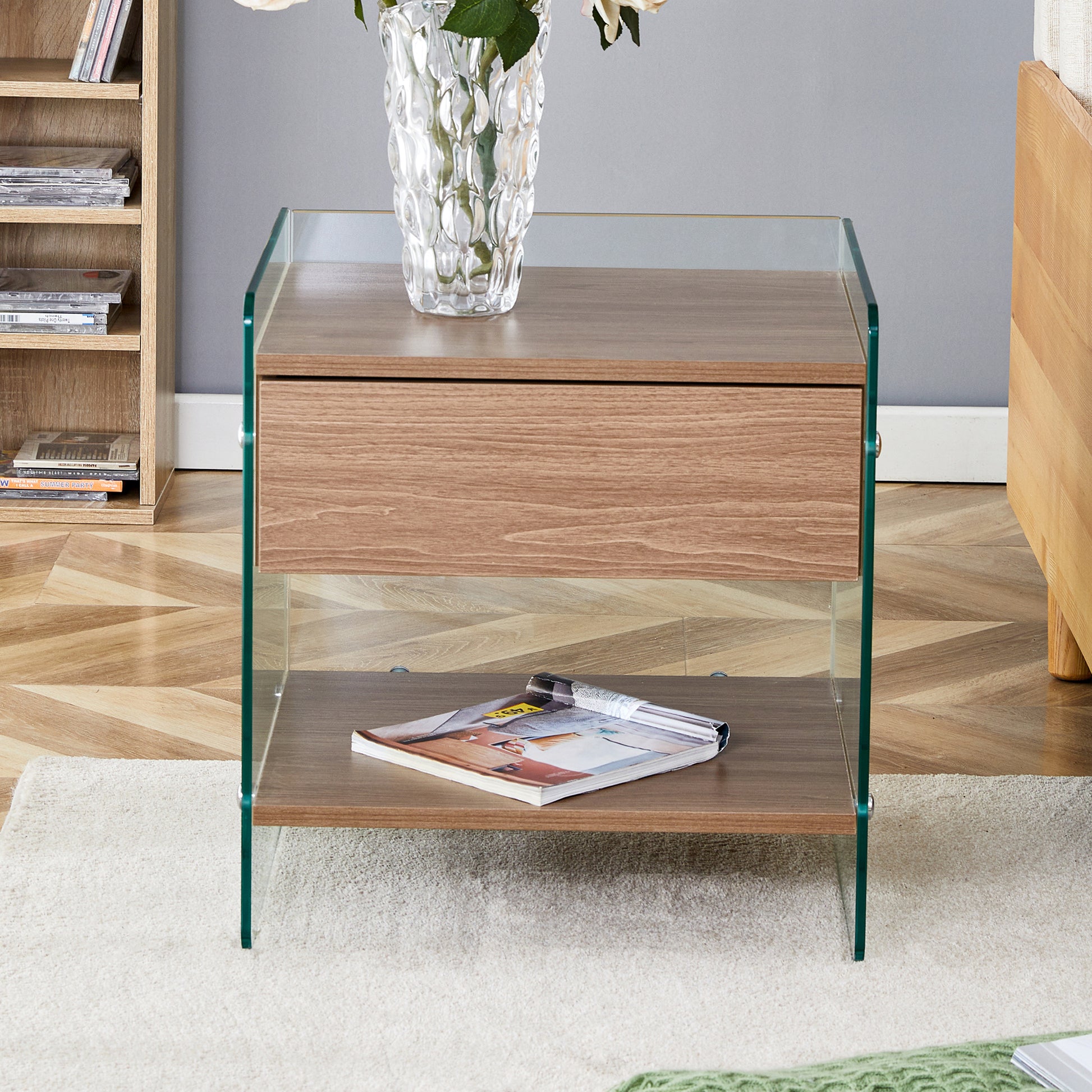 Bedside table with drawers. The board surface is MDF sticker, and both sides are transparent tempered glass. The design is simple and elegant, with excellent storage functions.