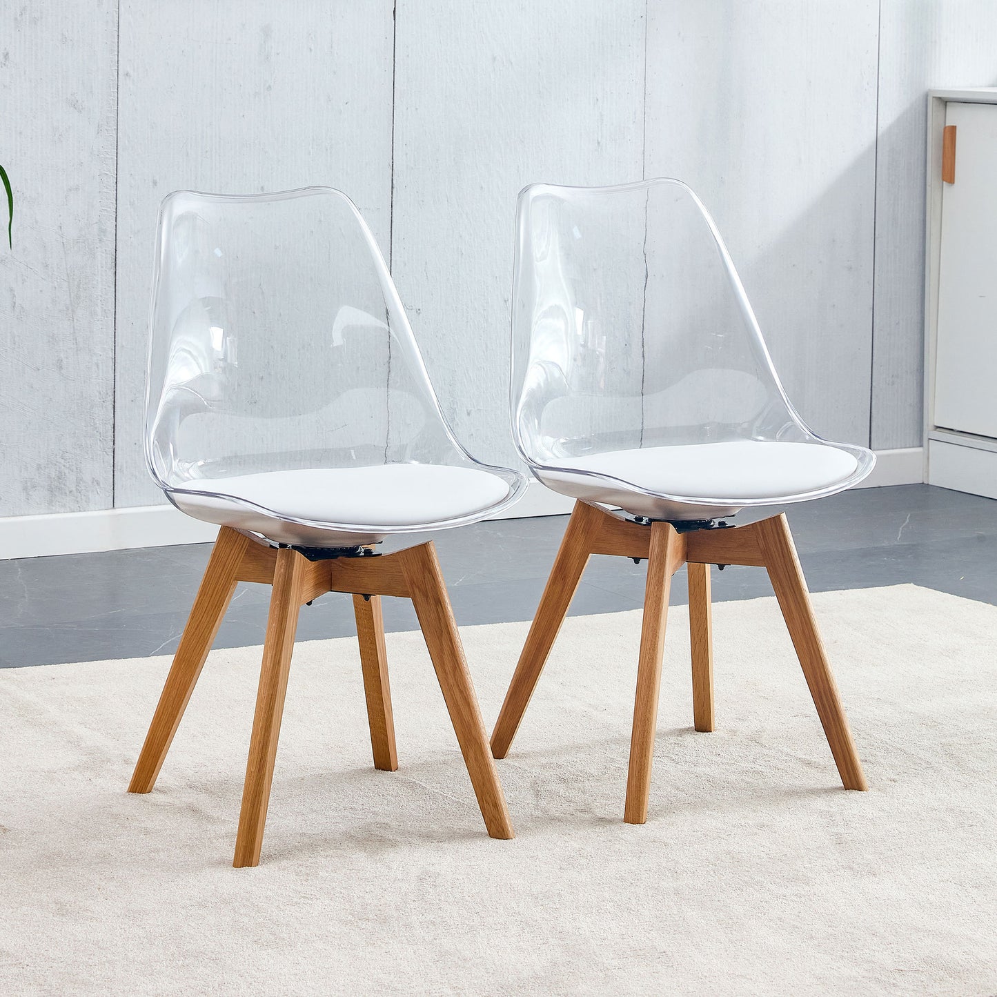 Modern chairs can rotate 360 degrees. The backrest is made of PET material, the seat cushion is made of PU material, and the support legs are made of oak. (Set of 4)