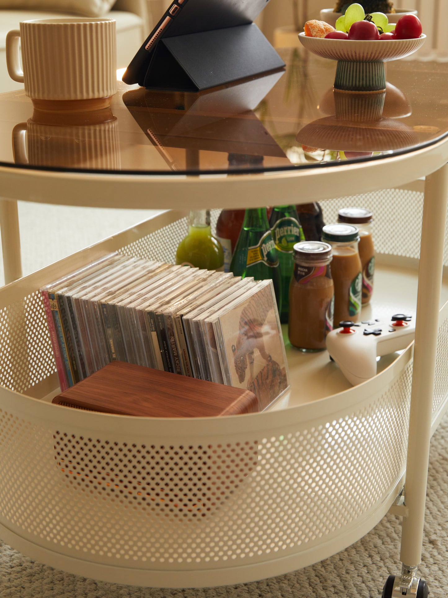 Movable oval metal glass coffee table with storage