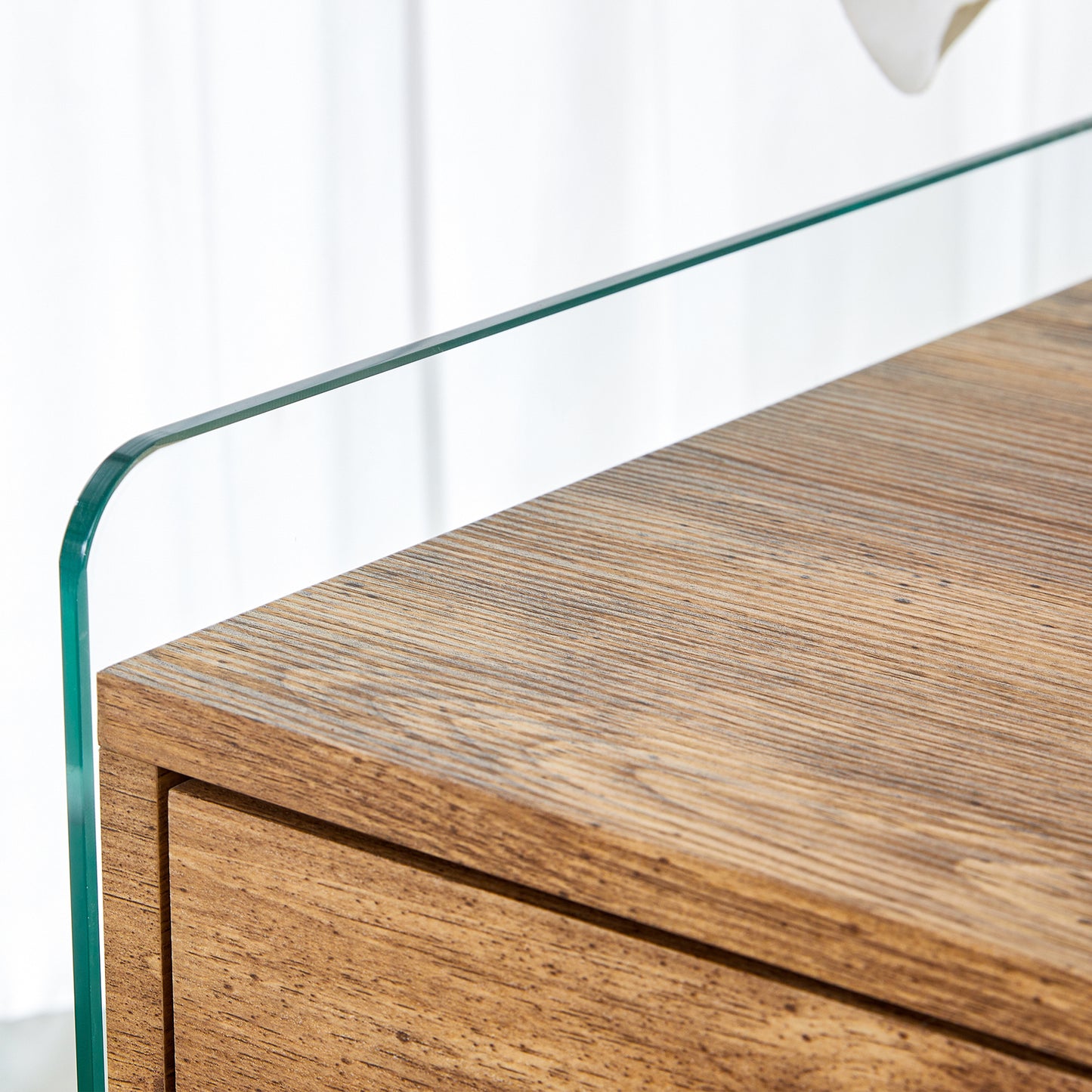 Double-drawer bedside table. The board surface is MDF sticker, and both sides are transparent tempered glass. The design is simple and elegant, with excellent storage functions.