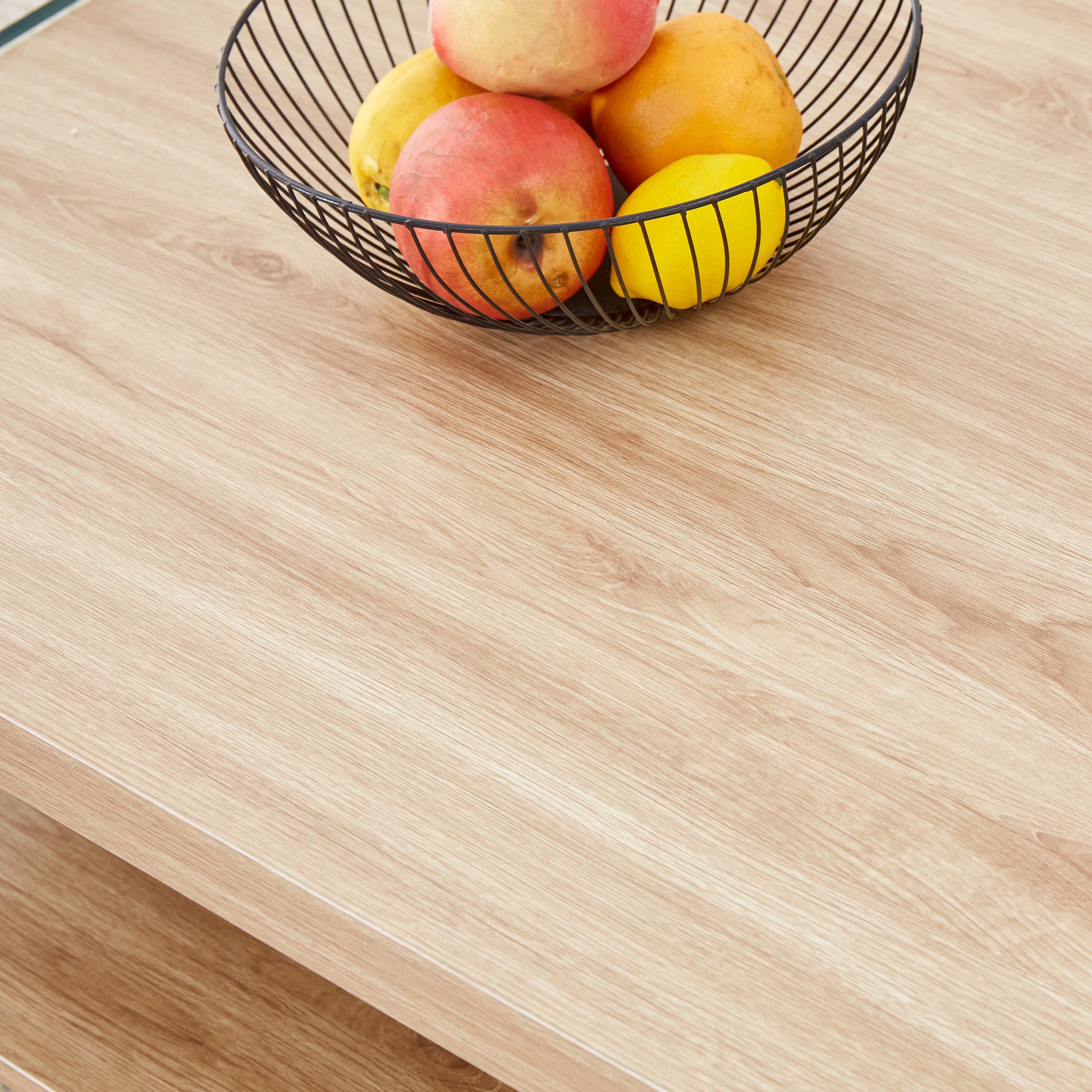 Double layered rectangular coffee table.The board is made of MDF with wooden stickers, with transparent tempered glass on both side.Suitable for various occasions such as living rooms and bedrooms.