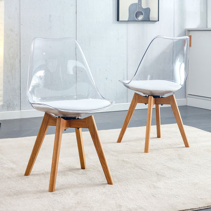 Modern chairs can rotate 360 degrees. The backrest is made of PET material, the seat cushion is made of PU material, and the support legs are made of oak. (Set of 4)